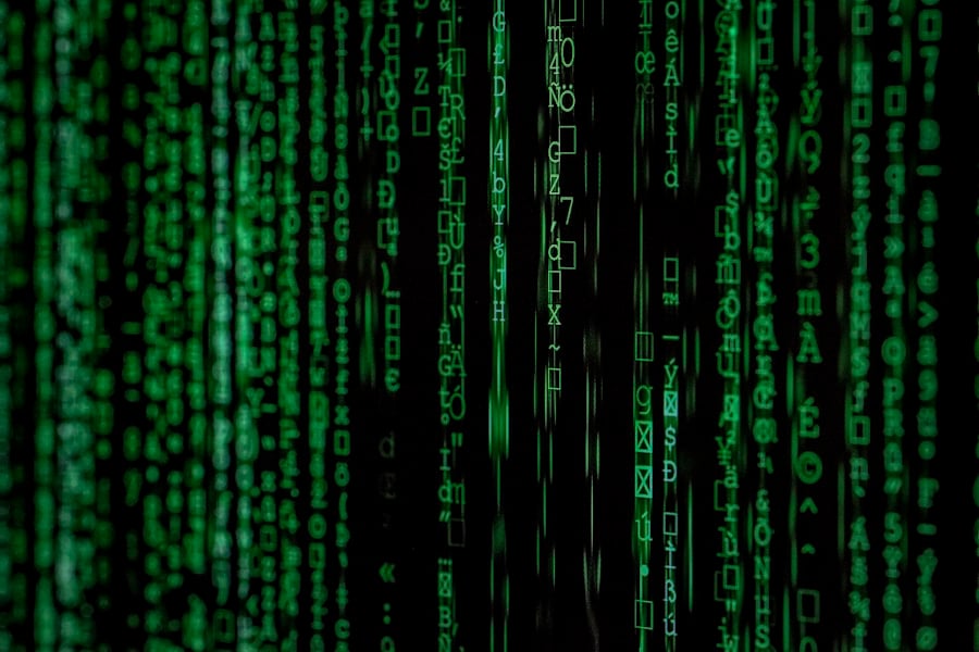 Green binary code streaming on a screen